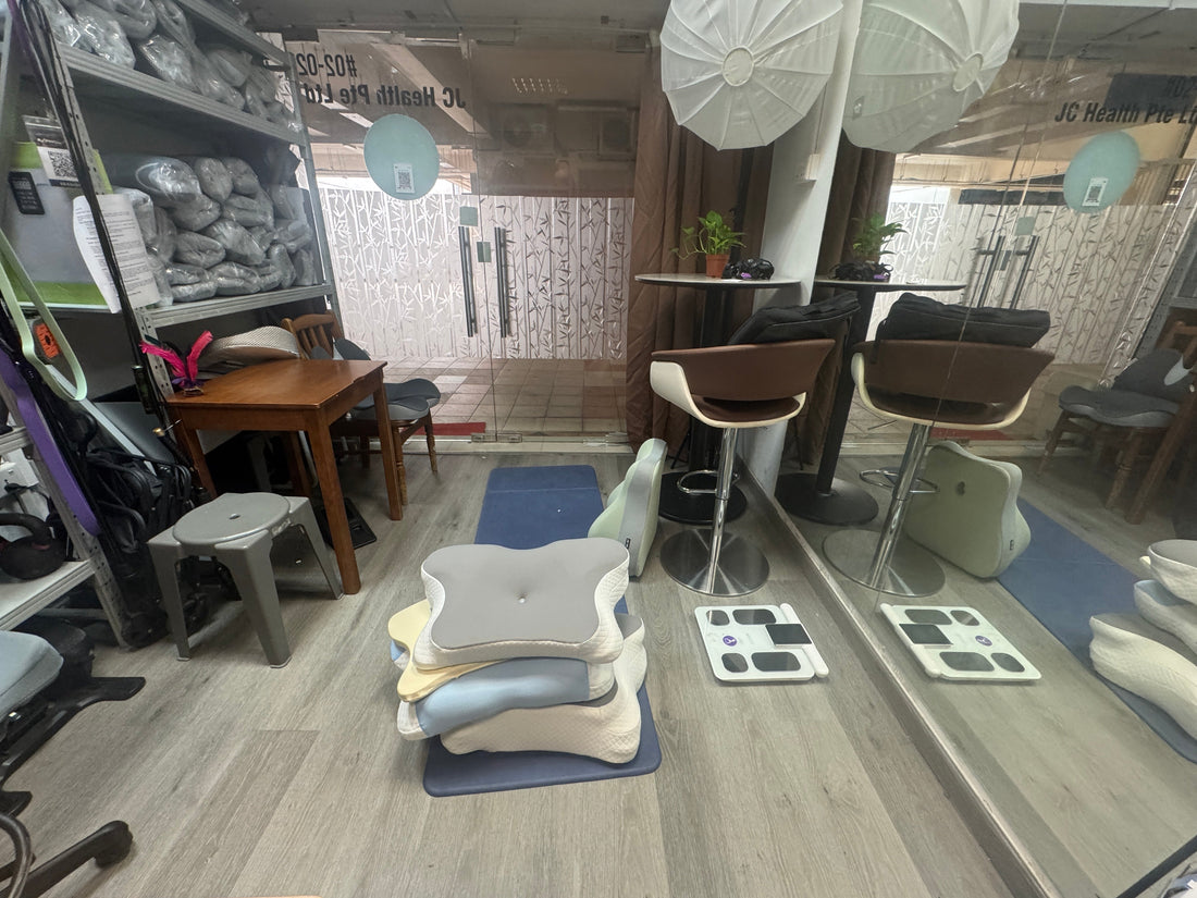 The aftermath of a busy 30 minutes! Pillows stacked on the testing mat and the smart scale ready—solving sleep and health needs one customer at a time at JC Health.