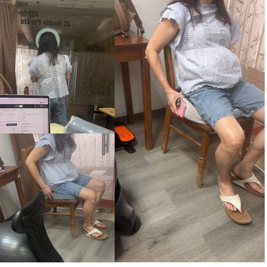 Customer testing 45cm donut cushion for tailbone fracture recovery during fitting session at JC Health Singapore.