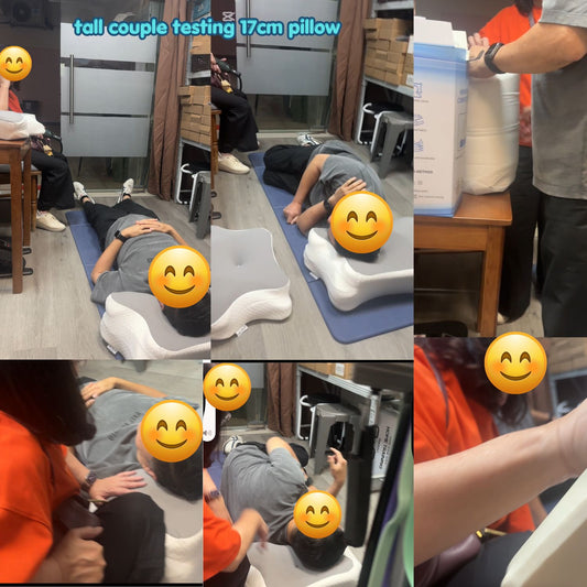 A tall customer testing the 17cm adjustable memory foam pillow for side sleeping and shoulder joint pain relief at JC Health showroom