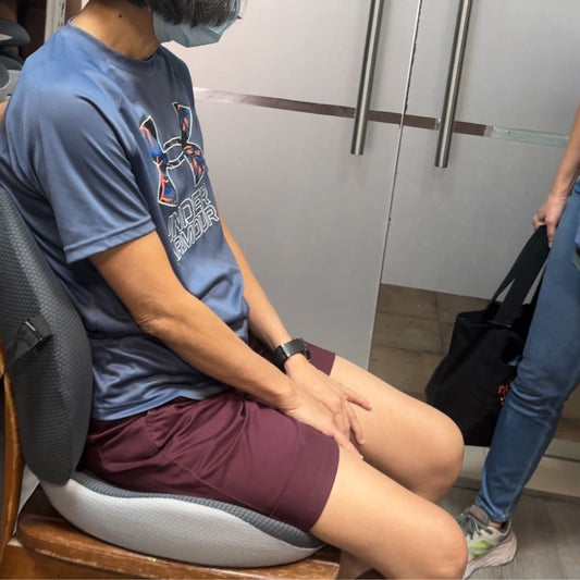 JC Health customer testing the 3rd Edition Ergonomic Cushion set at our Waterloo Centre showroom. Real-life demonstration of the 45.5cm wider seat and 34cm taller back support for tailbone and spinal relief.