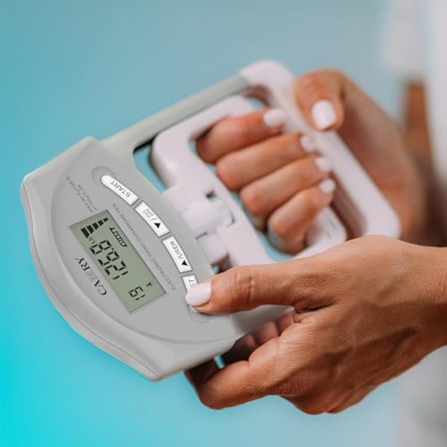 a person is testing her right Hand grip  strength at 126 lb reading from the LED Screen