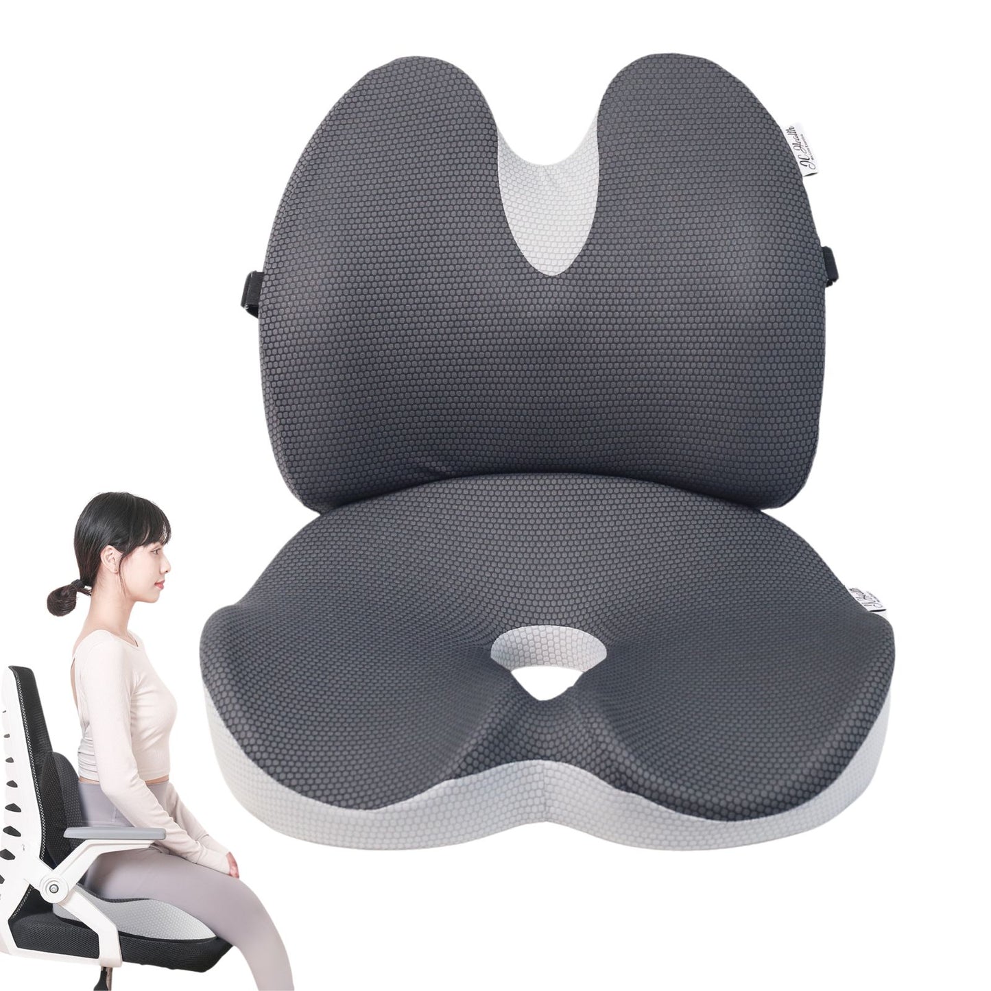 Grey ergonomic lumbar support and seat cushion set on a black office chair with a person sitting correctly, illustrating proper posture and size