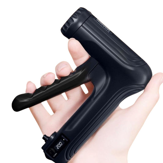 Black handheld device held in a hand on a white background