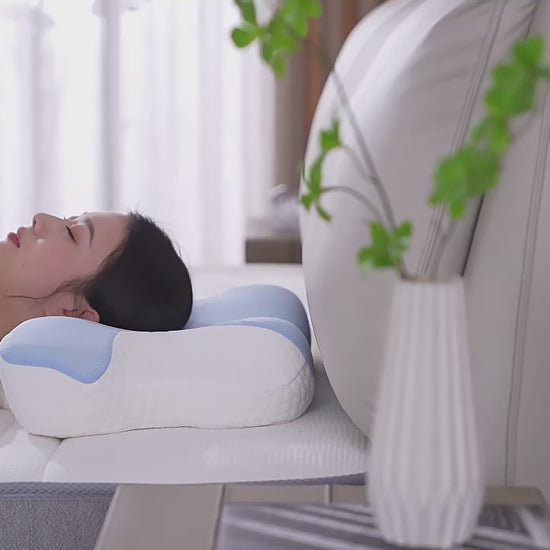 jchealth orthopaedic pillow video demonstrating how the ergonomic design supports the neck and spine for back and side sleepers, while also showing the pillow's memory foam material.