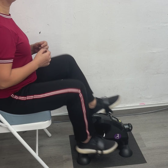 overview of JC Health Mini Pedal Exerciser for leg exercise adjustalbe resistant and easy hanle to carry to place on desk for upper body exercise